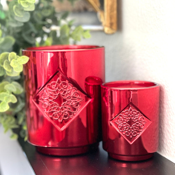 Load image into Gallery viewer, HOPE red metallic OPAL ROAD holiday scented candle in 10 ounce and 2.5 ounce sizes.