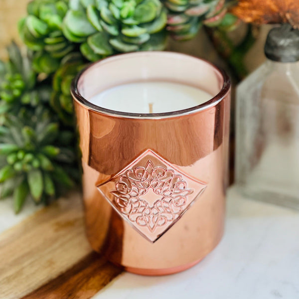 Load image into Gallery viewer, ENCHANTED rose gold metallic OPAL ROAD scented candle.
